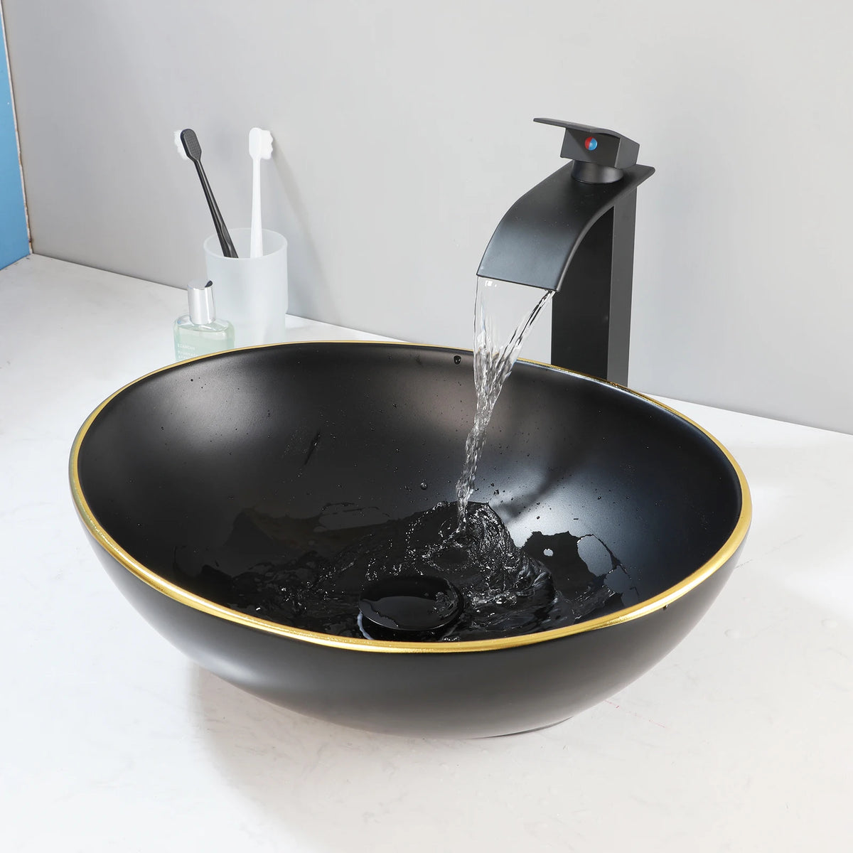 Mekkhala Oval Ceramic Vessel Sink With Waterfall Faucet